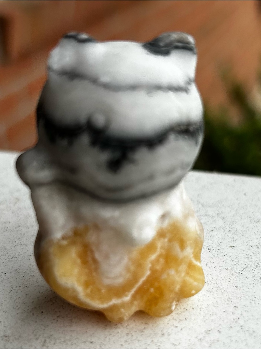 Hand-Carved Yellow and White Stone Accent Figurine - Picture 2 of 3